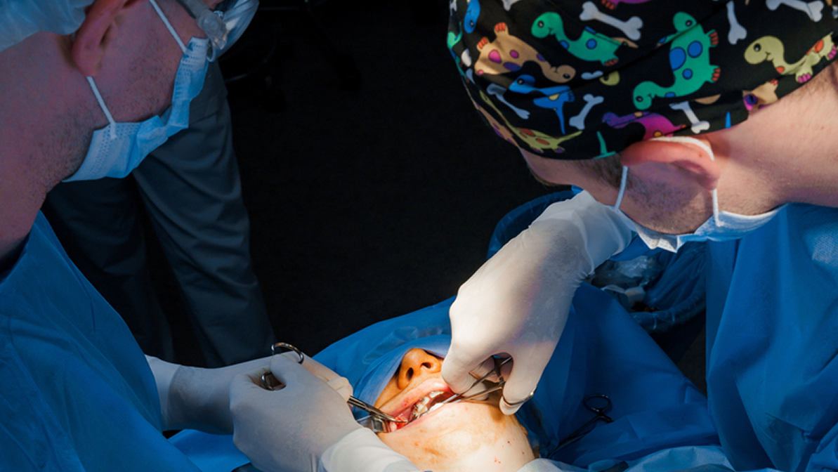 Buccal fat removal. Bisha lumps removal. Plastic surgery in clinic. Plastic surgery operation for modifying face in medical clinic.
